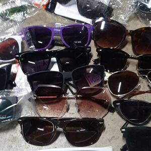 40 pair of assorted sunglasses